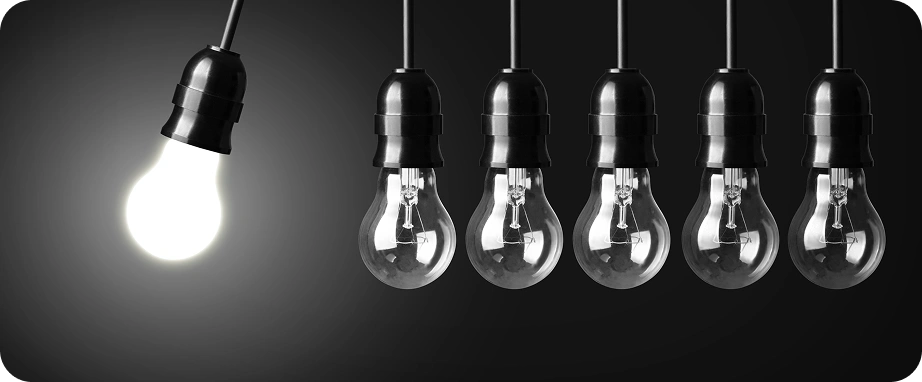 one bulb on in a row of bulbs